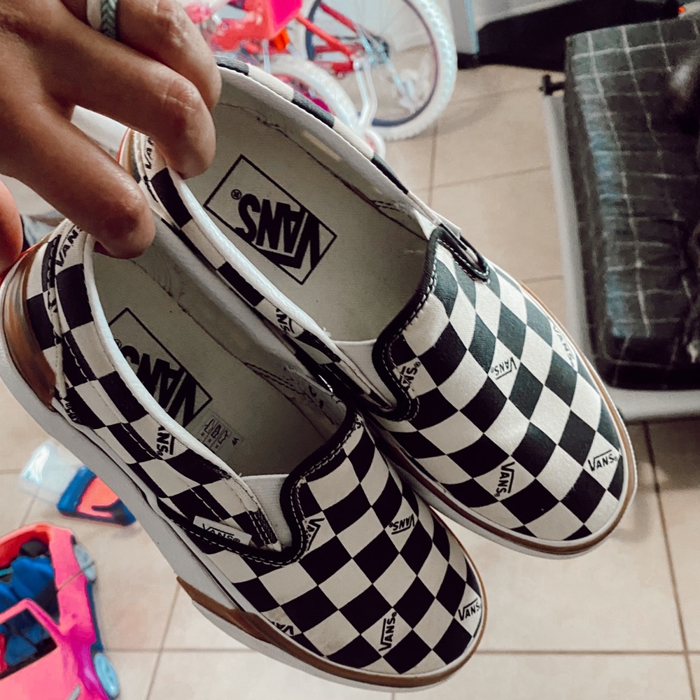 Vans classic slip on.